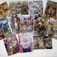 Colorful animal paintings arranged on white background