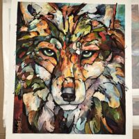 A "Song On The Wind" Limited Edition Print of a wolf on a piece of paper.