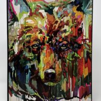 Colorful abstract painting of a bear's face.