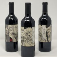 Three wine bottles with bear illustration labels