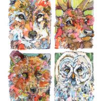 Four colorful watercolor animal portraits