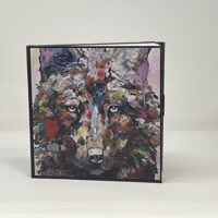 Colorful abstract wolf portrait on display